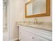 Bright bathroom featuring a white vanity with granite countertop at 50 Fieldview Ln, Covington, GA 30016