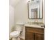 Compact half bathroom with a modern granite countertop and vanity at 50 Fieldview Ln, Covington, GA 30016