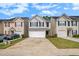 Attractive two-story home with a one-car garage and driveway parking at 50 Fieldview Ln, Covington, GA 30016