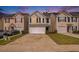 Charming two-story home with a one-car garage and driveway parking at 50 Fieldview Ln, Covington, GA 30016