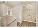 Convenient upstairs laundry area, ready for washer and dryer with laminate floors at 50 Fieldview Ln, Covington, GA 30016