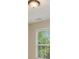 A window letting in light to the interior at 50 Fieldview Ln, Covington, GA 30016