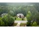 Residential home nestled within a wooded lot that provides lots of privacy at 7406 Cherry Blossom Way, Winston, GA 30187