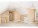 Large carpeted bedroom featuring a ceiling fan and a door to an ensuite bath at 7406 Cherry Blossom Way, Winston, GA 30187