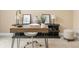 Bright home office featuring a modern desk and stylish decor and furniture at 7406 Cherry Blossom Way, Winston, GA 30187