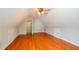Bonus room with hardwood floors and dormer windows at 9157 Golfview Cir, Covington, GA 30014