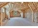 This large attic features natural light, wood framing, and insulation at 157 Palisade Ne Dr, Rydal, GA 30171