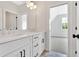 Bathroom featuring a dual sink vanity with bright white countertops at 157 Palisade Ne Dr, Rydal, GA 30171