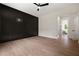 Bathroom with feature wall and an entrance to another room at 157 Palisade Ne Dr, Rydal, GA 30171