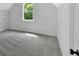 Cozy bedroom featuring soft carpet and a bright window at 157 Palisade Ne Dr, Rydal, GA 30171