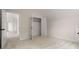 Bedroom with neutral carpet, and an open closet offering storage space, with views to the hallway at 157 Palisade Ne Dr, Rydal, GA 30171