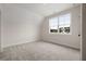Bedroom with large windows offering plenty of natural light and neutral colored walls at 157 Palisade Ne Dr, Rydal, GA 30171