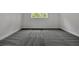 Large bedroom space featuring modern grey carpeting and plenty of light at 157 Palisade Ne Dr, Rydal, GA 30171
