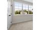 Bedroom featuring large windows offering an expansive view of the neighborhood at 157 Palisade Ne Dr, Rydal, GA 30171
