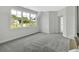 Spacious bedroom with a large window offering plenty of natural light at 157 Palisade Ne Dr, Rydal, GA 30171