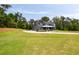 Attractive two-story gray home with an attached garage and spacious front yard at 157 Palisade Ne Dr, Rydal, GA 30171