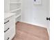 A white, bright room with built in shelves and white cabinets at 157 Palisade Ne Dr, Rydal, GA 30171