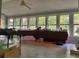 Spacious sunroom with large windows, perfect for enjoying the outdoors indoors at 161 E 78 Hwy, Temple, GA 30179