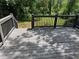 Painted deck area offers outdoor living space surrounded by natural beauty at 2903 Santa Barbara Dr, Decatur, GA 30032