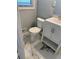 This bathroom features tile floors, a toilet, and a vanity with cabinet storage space at 2903 Santa Barbara Dr, Decatur, GA 30032