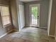 Spacious bedroom with tiled floors, closet, and exterior access at 2903 Santa Barbara Dr, Decatur, GA 30032
