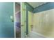 Outdated bathroom with a shower and tub combo and a doorway for convenient access at 3391 Quail Hollow Trl, Snellville, GA 30039