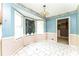 Breakfast nook with white tile floors and a bay window at 3391 Quail Hollow Trl, Snellville, GA 30039