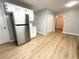 Modern kitchen with stainless steel appliances and ample cabinet space at 5464 Fox Haven Trl, Stone Mountain, GA 30088