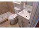 Bathroom with toilet, sink with vanity, and tile shower with white hexagon tile floor at 679 Winchester Ln, Norcross, GA 30071