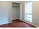 Bedroom features a closet and a window at 679 Winchester Ln, Norcross, GA 30071