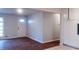 Inviting living room featuring bright walls, a front door with sidelight, and hardwood flooring at 679 Winchester Ln, Norcross, GA 30071