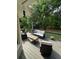 A spacious back deck with outdoor seating offers views of the surrounding greenery at 1305 Lake Forest Ln, Mcdonough, GA 30253