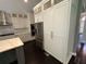 Well-equipped kitchen with a stainless steel fridge, backsplash and modern appliances at 1305 Lake Forest Ln, Mcdonough, GA 30253