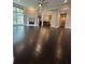 Spacious living room with a cozy fireplace and an open floor plan at 1305 Lake Forest Ln, Mcdonough, GA 30253