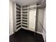 Well-organized walk-in closet with custom shelving and ample storage space at 1305 Lake Forest Ln, Mcdonough, GA 30253
