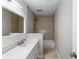 Bathroom with white vanity, bathtub, and stylish shower at 1480 Shady Cove Ln, Lawrenceville, GA 30043