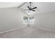 Bright bedroom with vaulted ceilings, plush carpeting, and double windows at 1480 Shady Cove Ln, Lawrenceville, GA 30043