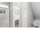 Hallway with doorway to bedroom and desk area at 1480 Shady Cove Ln, Lawrenceville, GA 30043