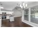 Bright open floor plan with eat-in kitchen, stainless appliances, and an adjacent living room at 1480 Shady Cove Ln, Lawrenceville, GA 30043