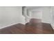 Cozy living room featuring hardwood floors, staircase, and an open layout at 1480 Shady Cove Ln, Lawrenceville, GA 30043