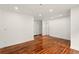 Bright living room featuring hardwood floors, recessed lighting, and neutral paint for a modern and spacious feel at 1599 Sandtown Rd, Atlanta, GA 30311
