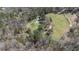 Stunning property featuring a well-placed home, cleared land, and a serene tree line at 689 Hardin Rd, Temple, GA 30179