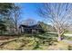 Charming single story brick home with covered porch and a long driveway at 689 Hardin Rd, Temple, GA 30179