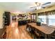 Open floor plan with kitchen, dining area, and breakfast bar, perfect for entertaining guests at 689 Hardin Rd, Temple, GA 30179