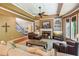 Spacious living room with a fireplace, built-in shelving, and an open floor plan at 1320 Magnolia Park Cir, Cumming, GA 30040