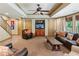 Finished basement area with seating, television, and staircase at 1320 Magnolia Park Cir, Cumming, GA 30040