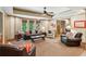 Finished basement area with living room, seating and office space at 1320 Magnolia Park Cir, Cumming, GA 30040