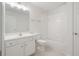 Bathroom with white vanity and shower at 2561 Grapevine Cir # 104, Cumming, GA 30041