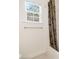 Bathroom with a shower, tub, window, and patterned shower curtain at 2561 Grapevine Cir # 104, Cumming, GA 30041