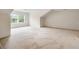 Bonus room featuring neutral carpet and light paint at 2561 Grapevine Cir # 104, Cumming, GA 30041